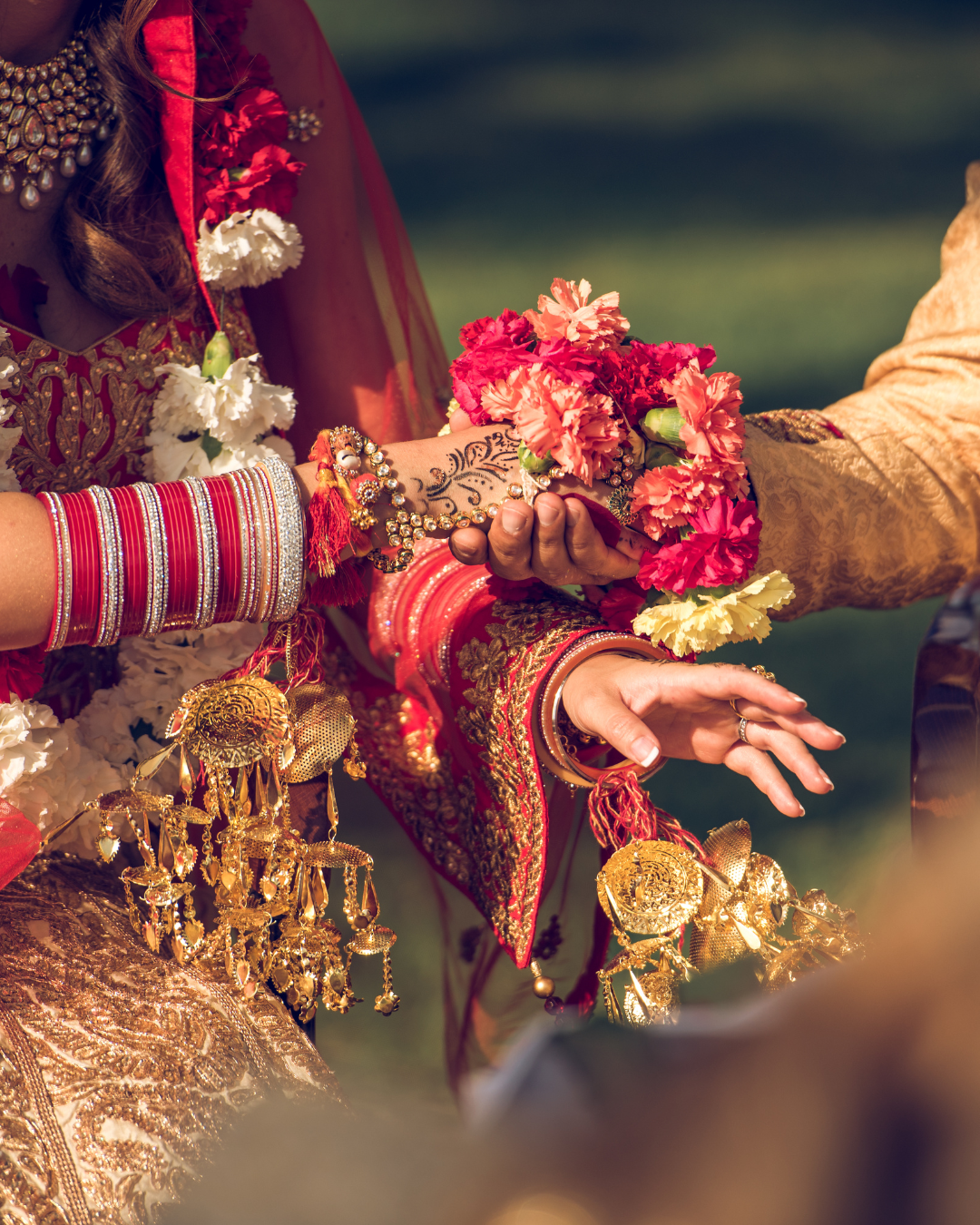 South Asian bride and groom holding hands. Image from Inaury.com for blog post "the ultimate prep guide for desi weddings"