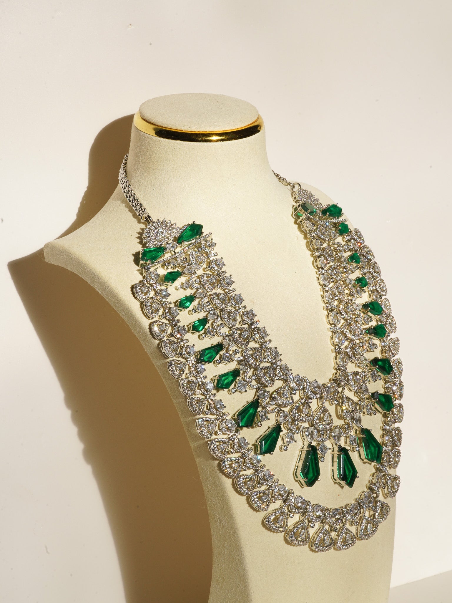 Ashma - Multilayer Rhodium Plated Silver Finish & Emerald Green Bridal Set