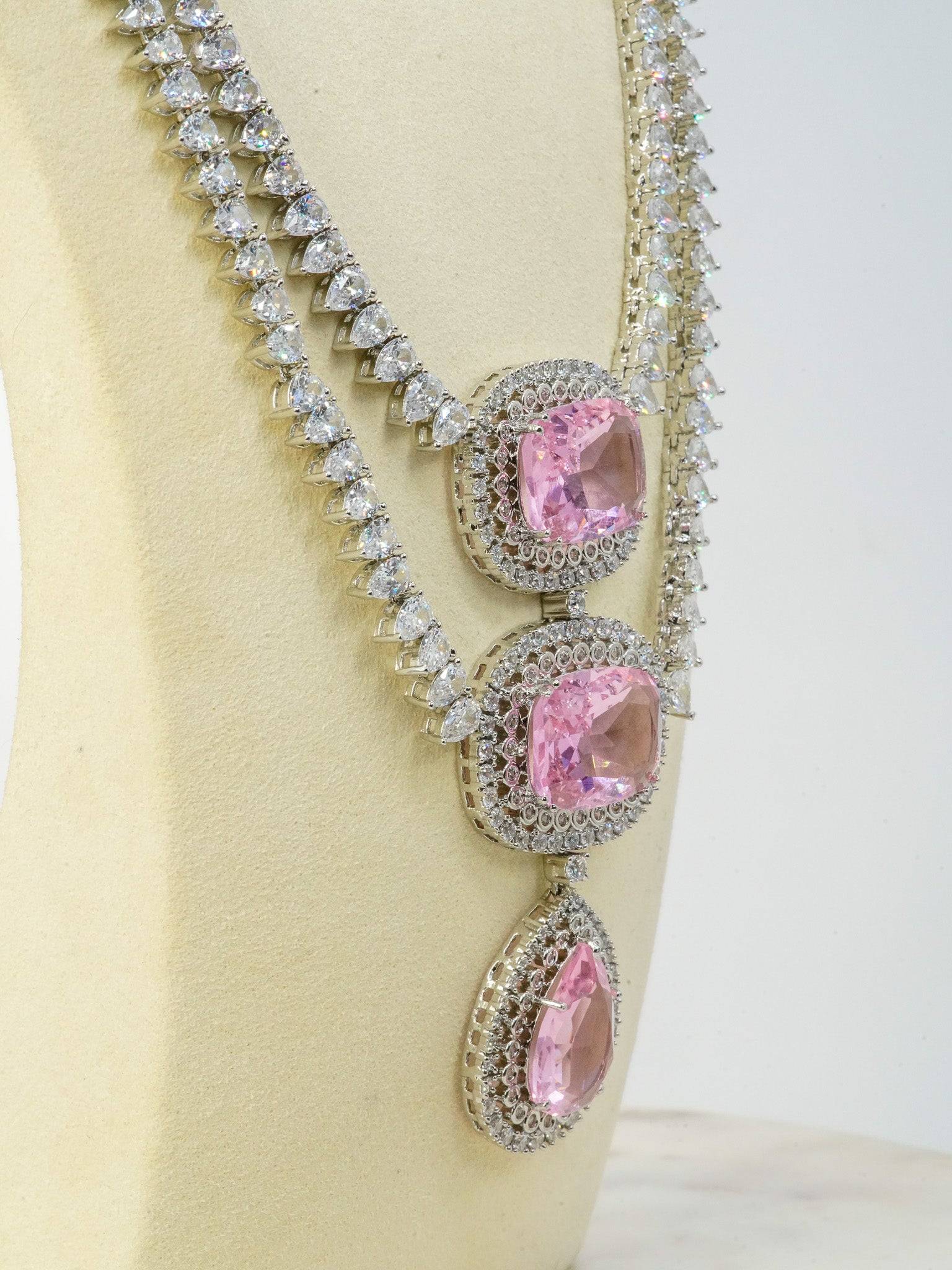 Pink Teardrop Statement Earrings and Necklace Set on Display