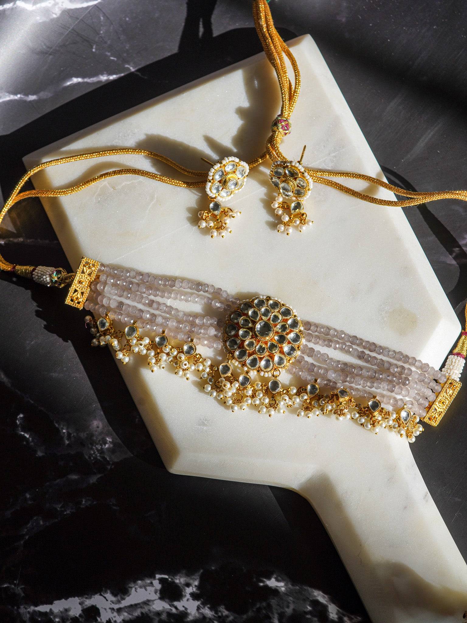 Indian Jewelry - Aaina Gold-Plated Kundan Choker Necklace Set with Lavender Beads, showcasing exquisite craftsmanship.