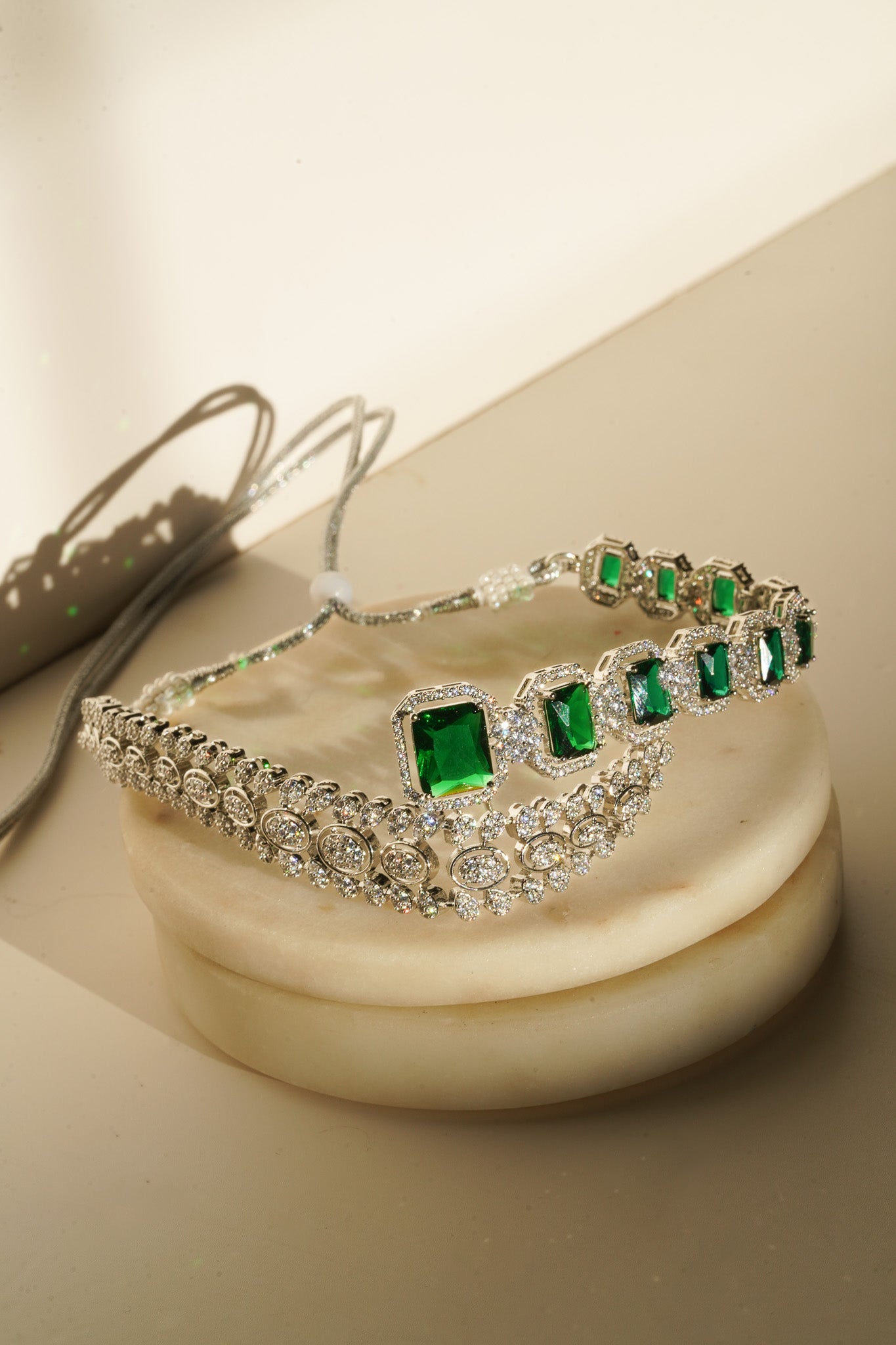 Ashma - Multilayer Rhodium Plated Silver Finish & Emerald Green Bridal Set