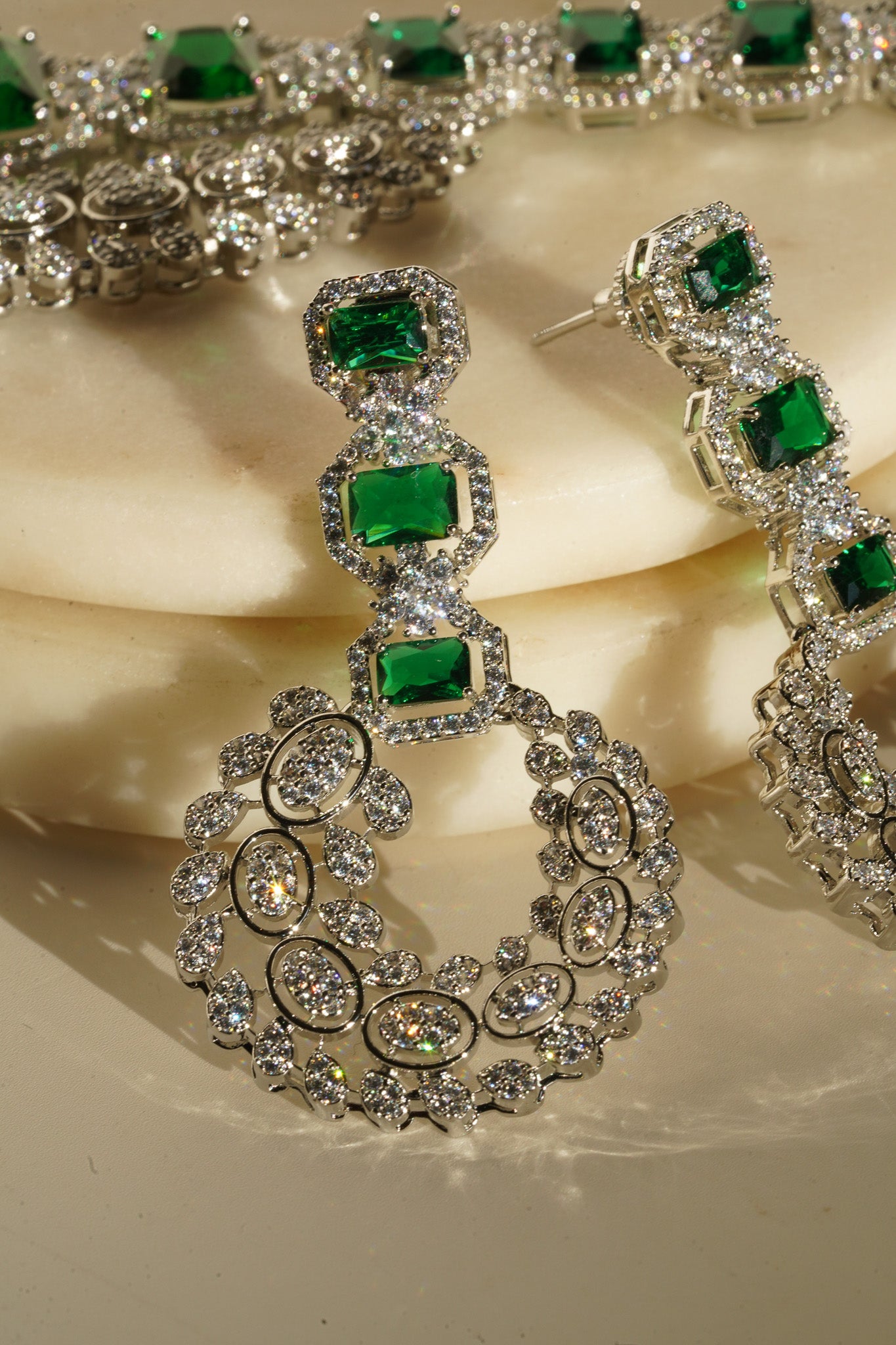 Ashma - Multilayer Rhodium Plated Silver Finish & Emerald Green Bridal Set