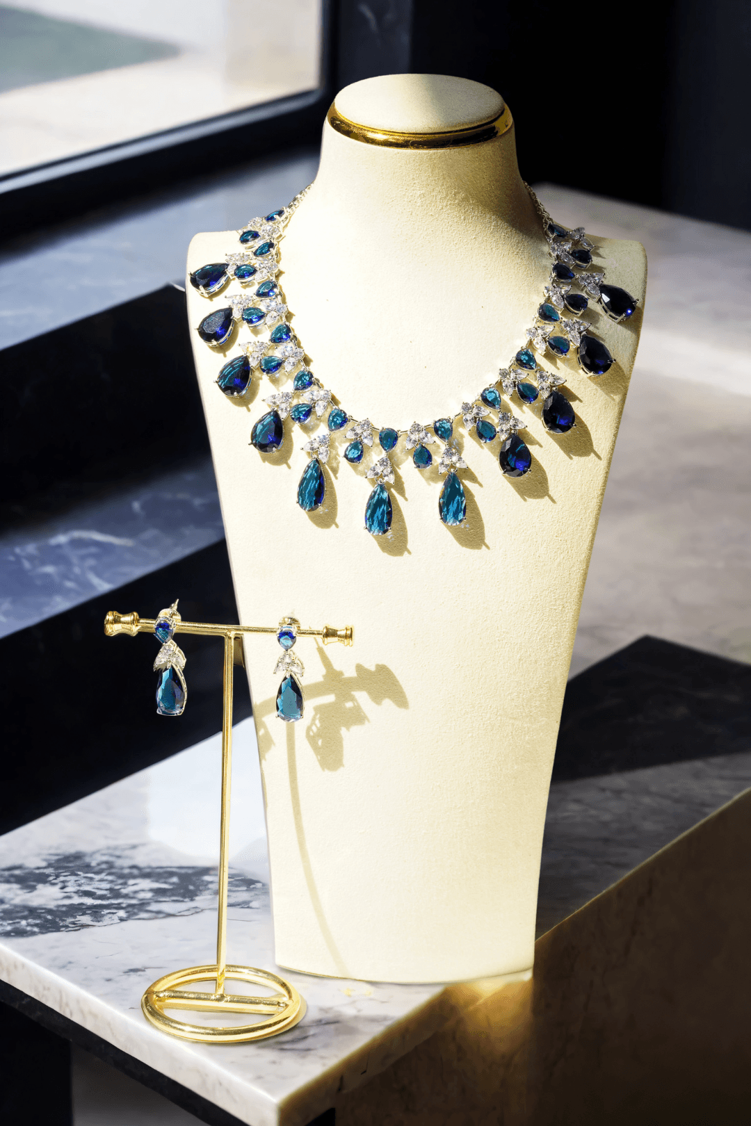 Kaira - Luminous Teardrop Crystal Necklace and Earrings Set