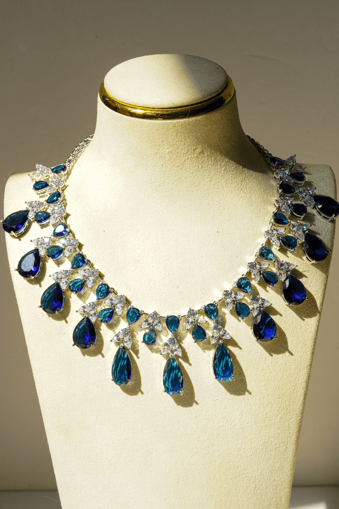 Kaira - Luminous Teardrop Crystal Necklace and Earrings Set