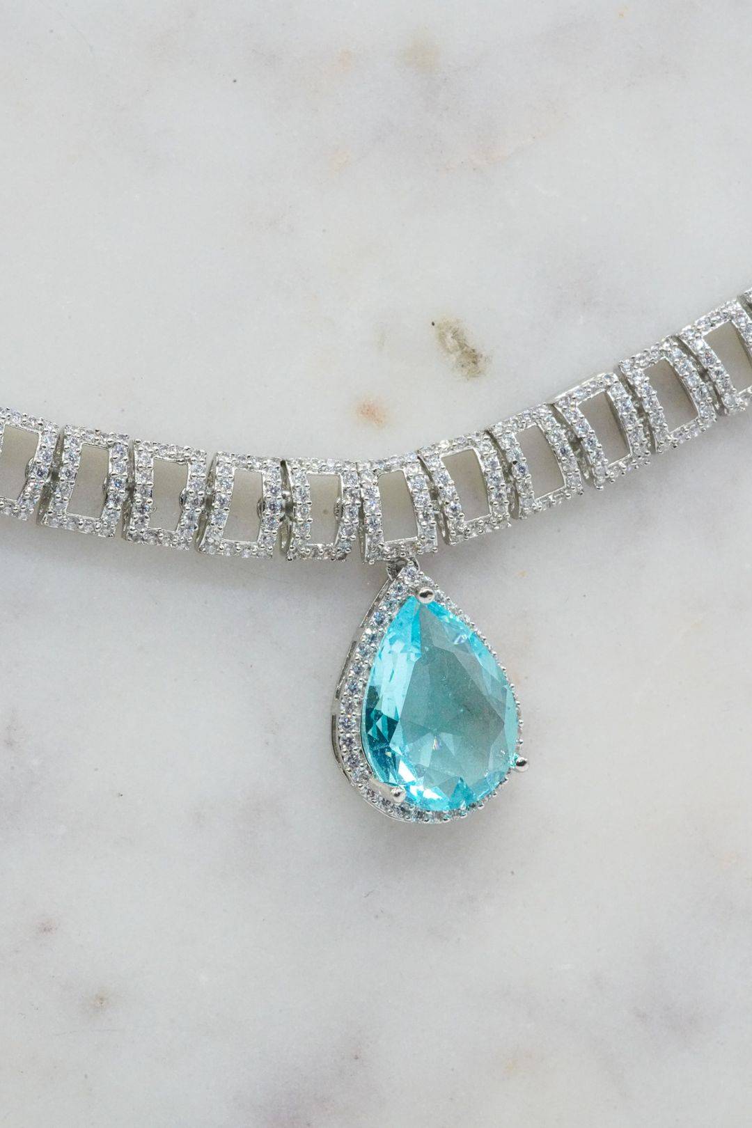 Malina Rhodium-Plated Necklace Set with Aqua Blue Teardrop Center Stone - Indian jewelry