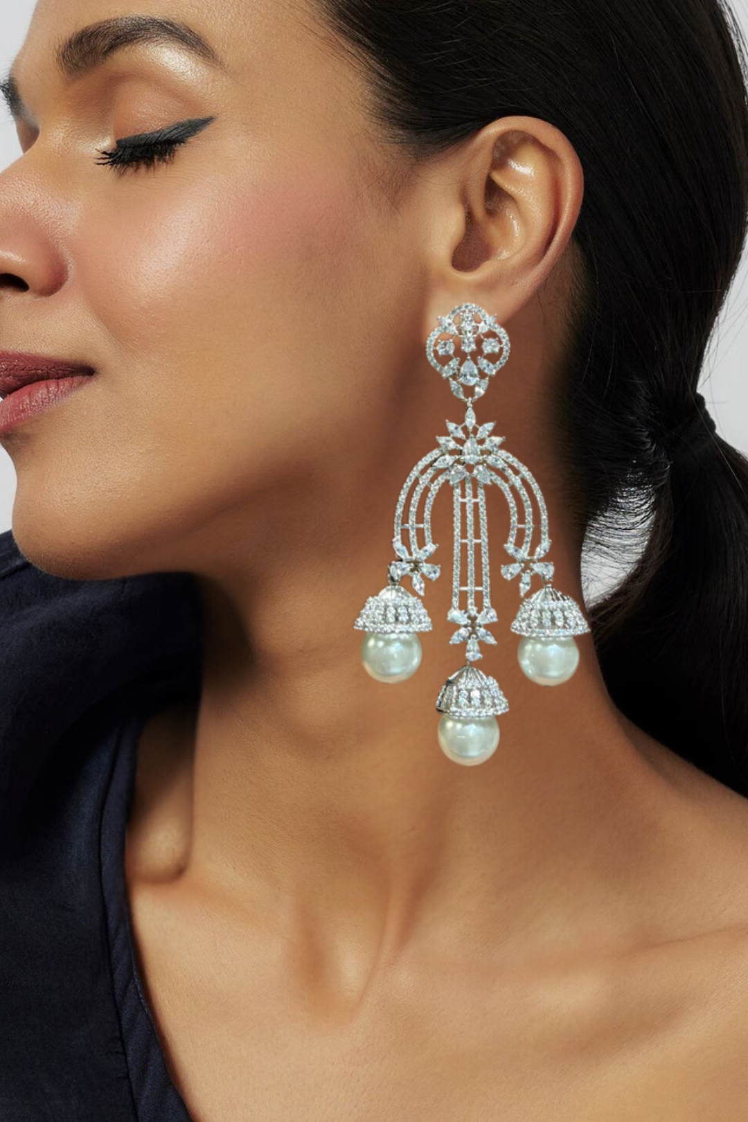 Raina - Pearl Jhumka Earrings with pavé-set white stones and faux pearls – Indian jewelry for bridal and festive wear.