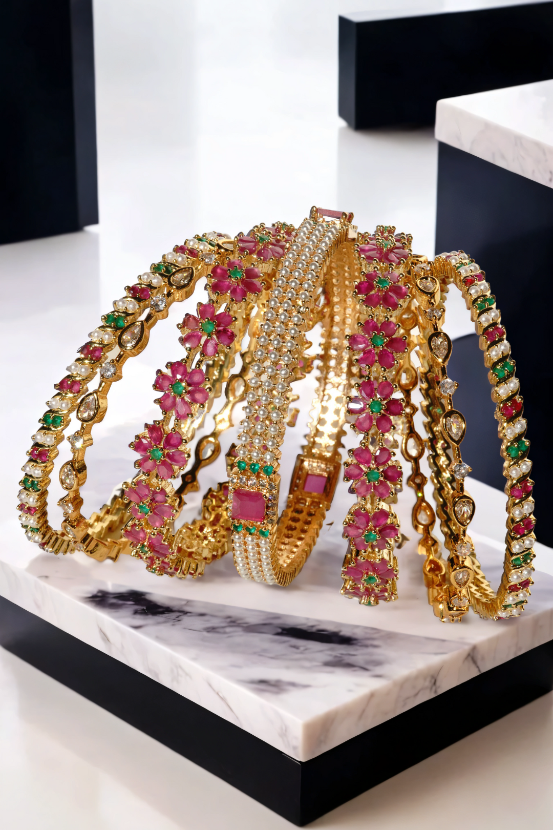 Arika 7-Piece Floral Gold-Plated Bangle Set with Emerald and Ruby Accents