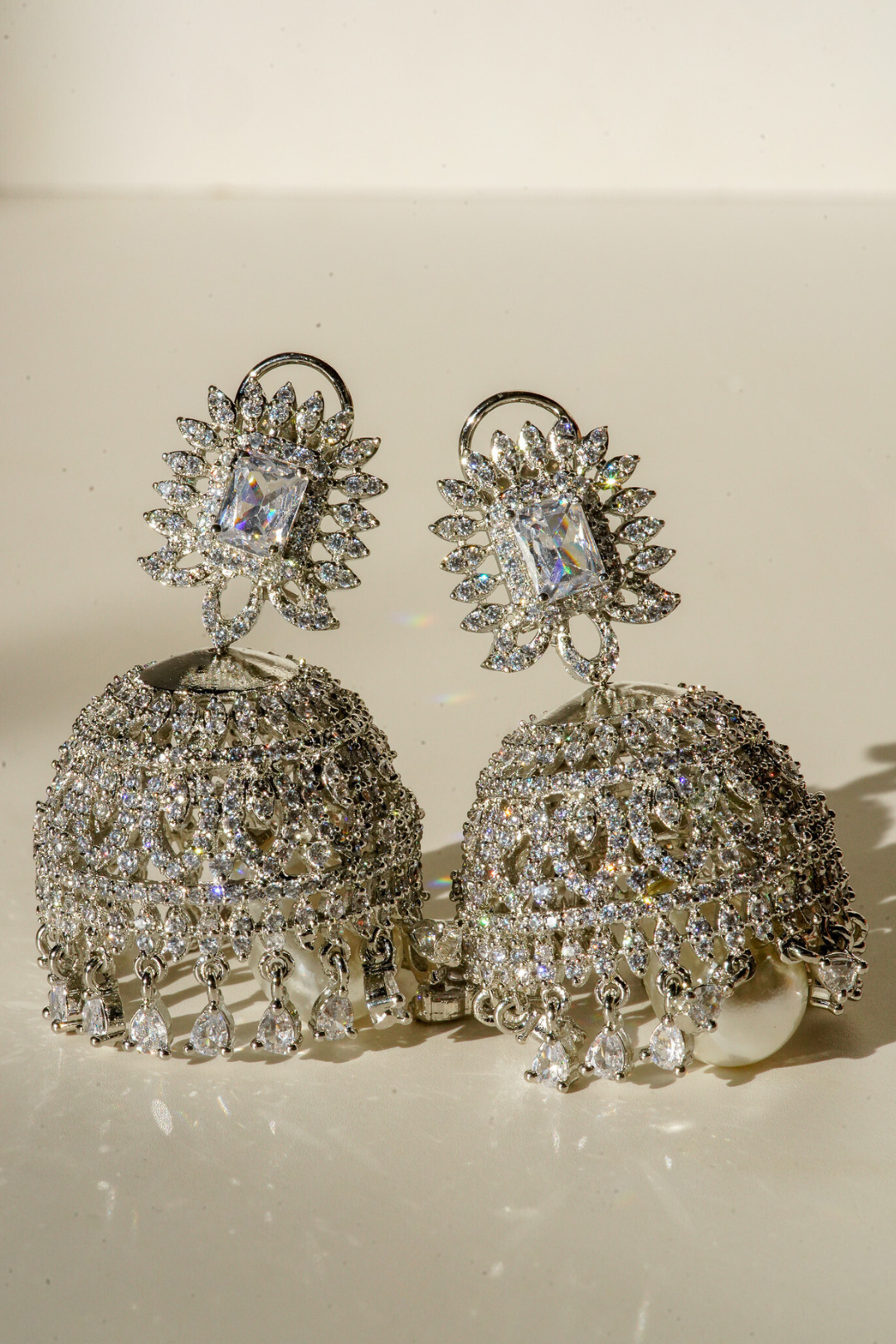 Erum Rhodium-Plated Jhumka Earrings with White Pavé Stones and Teardrop Pearl – Indian Bridal Jewelry