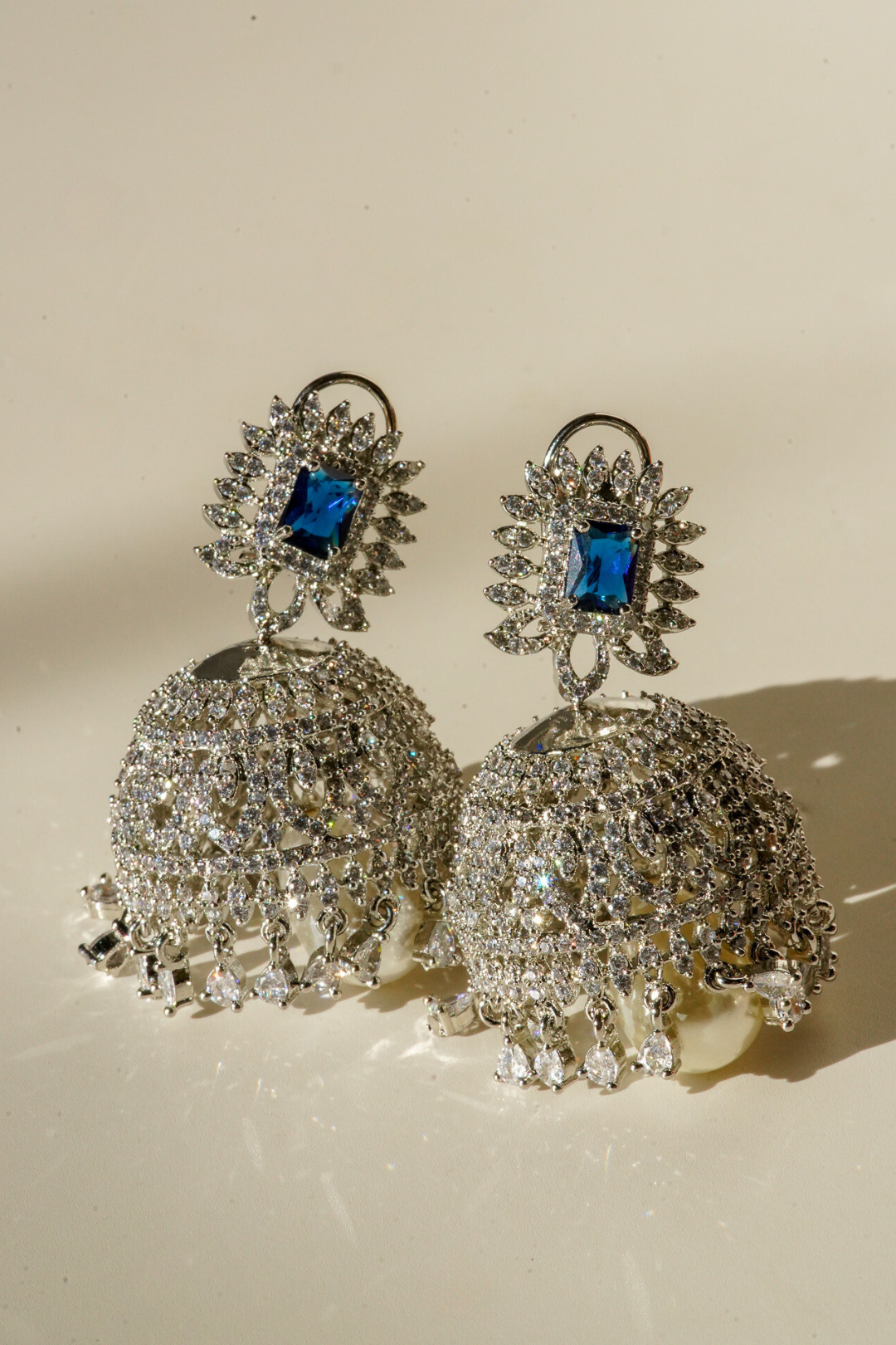 Erum Rhodium-Plated Jhumka Earrings with White Pavé Stones and Teardrop Pearl – Indian Bridal Jewelry