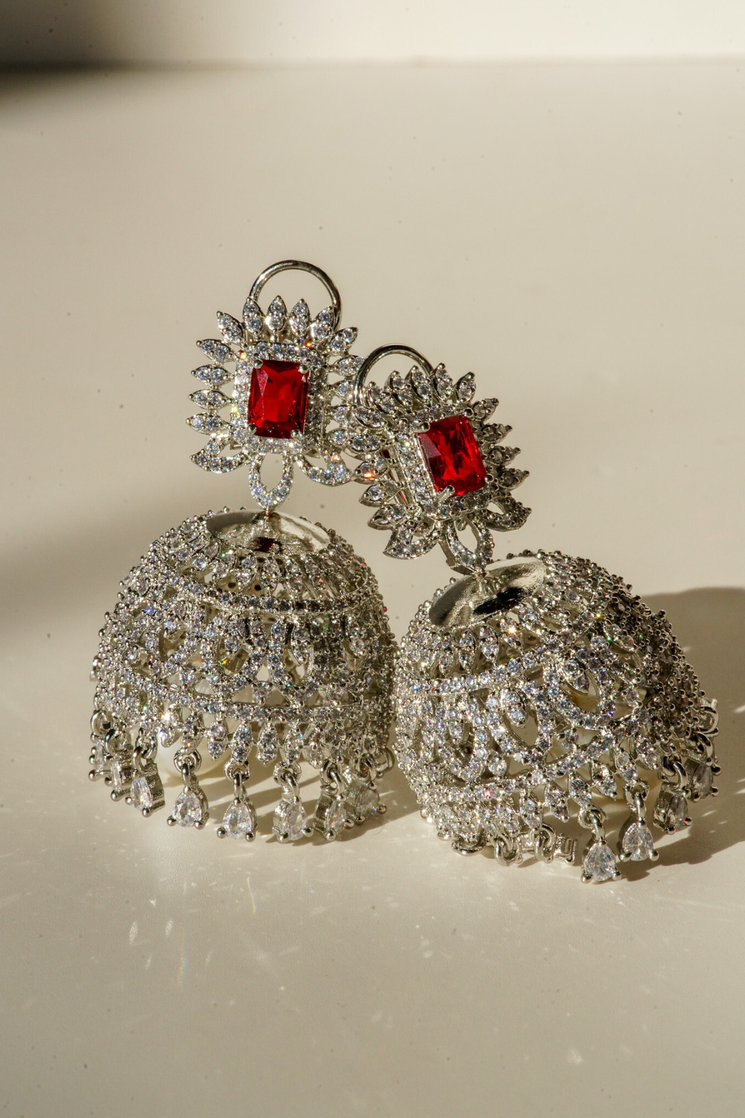 Erum Rhodium-Plated Jhumka Earrings with White Pavé Stones and Teardrop Pearl – Indian Bridal Jewelry