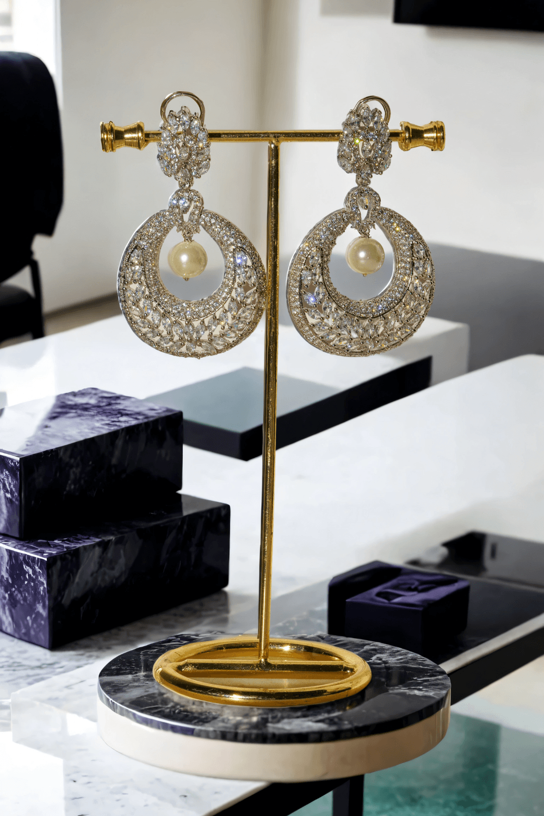 Esmeralda rhodium-plated crescent earrings with white stones and pearl drop, Indian jewelry, 2.8 inches long, for parties and weddings.