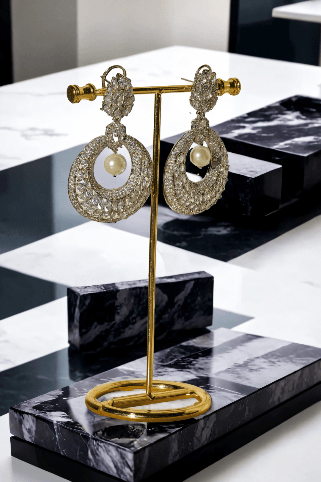 Esmeralda rhodium-plated crescent earrings with white stones and pearl drop, Indian jewelry, 2.8 inches long, for parties and weddings.