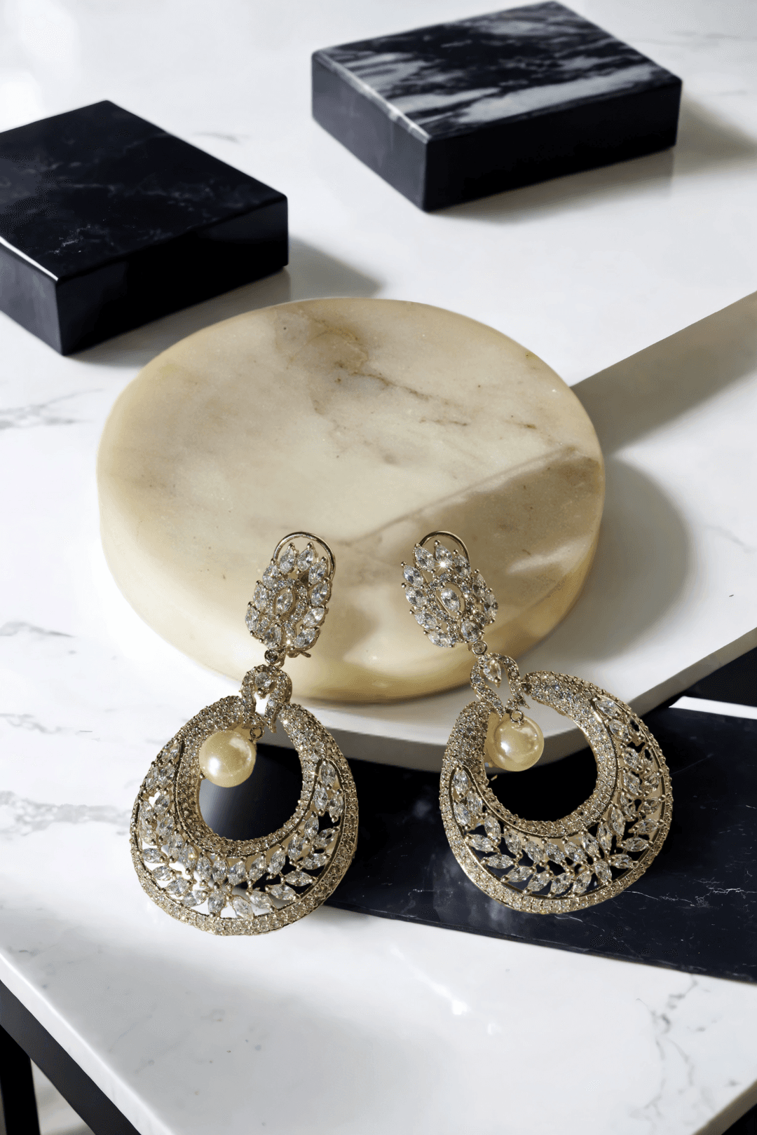 Esmeralda rhodium-plated crescent earrings with white stones and pearl drop, Indian jewelry, 2.8 inches long, for parties and weddings.