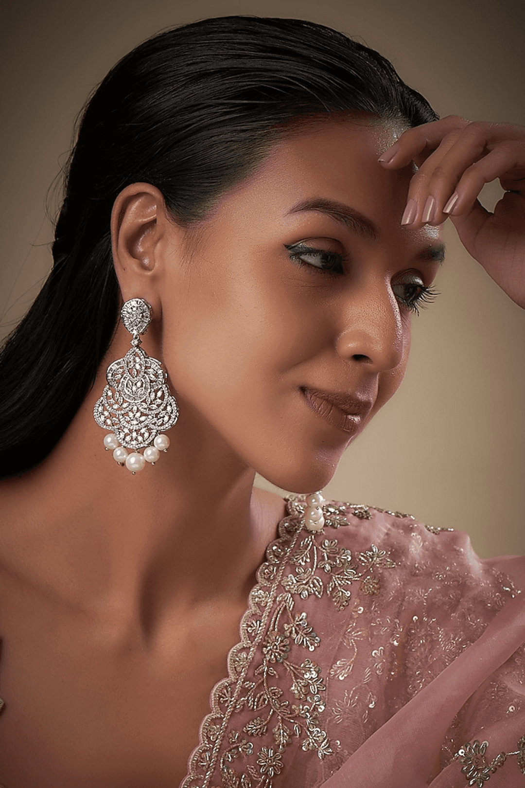 Irene Radiant Pearl Drop Earrings, rhodium-plated with intricate filigree design, pavé white stones, and pearl drops, 3.4 inches long - Indian jewelry for festive and wedding occasions.