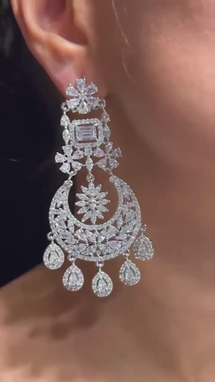 Samina chandelier earrings, rhodium-plated, white pavé stones, crescent design with teardrop charms, Indian jewelry