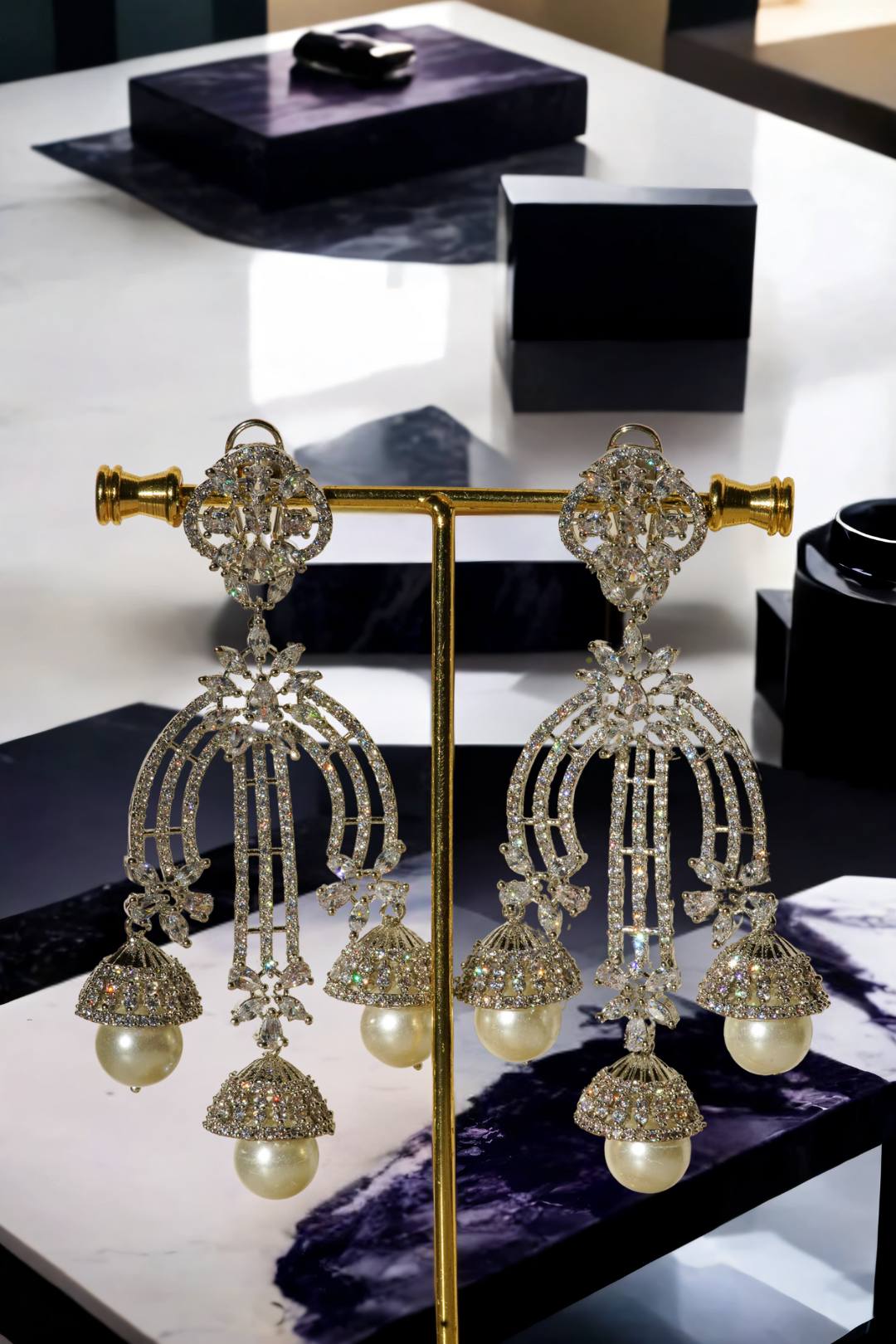 Raina - Pearl Jhumka Earrings with pavé-set white stones and faux pearls – Indian jewelry for bridal and festive wear.