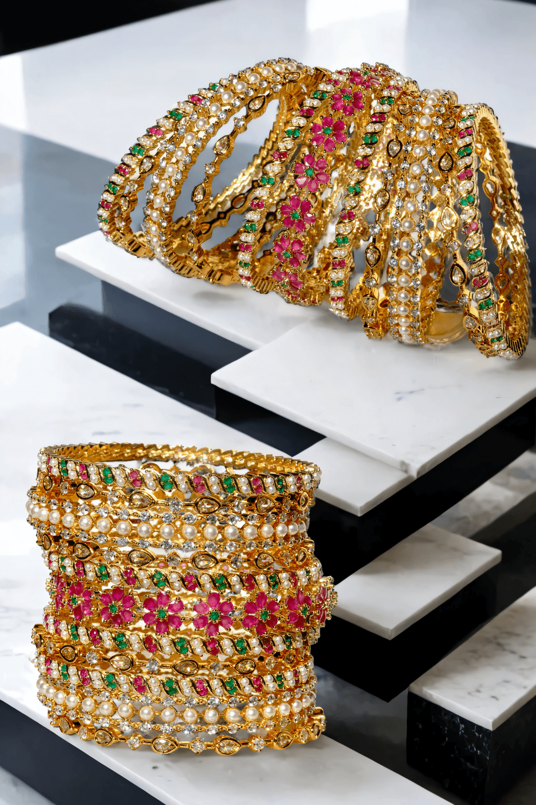 Tavisha 11-piece gold-plated floral and pearl bangle set with green and ruby accents.