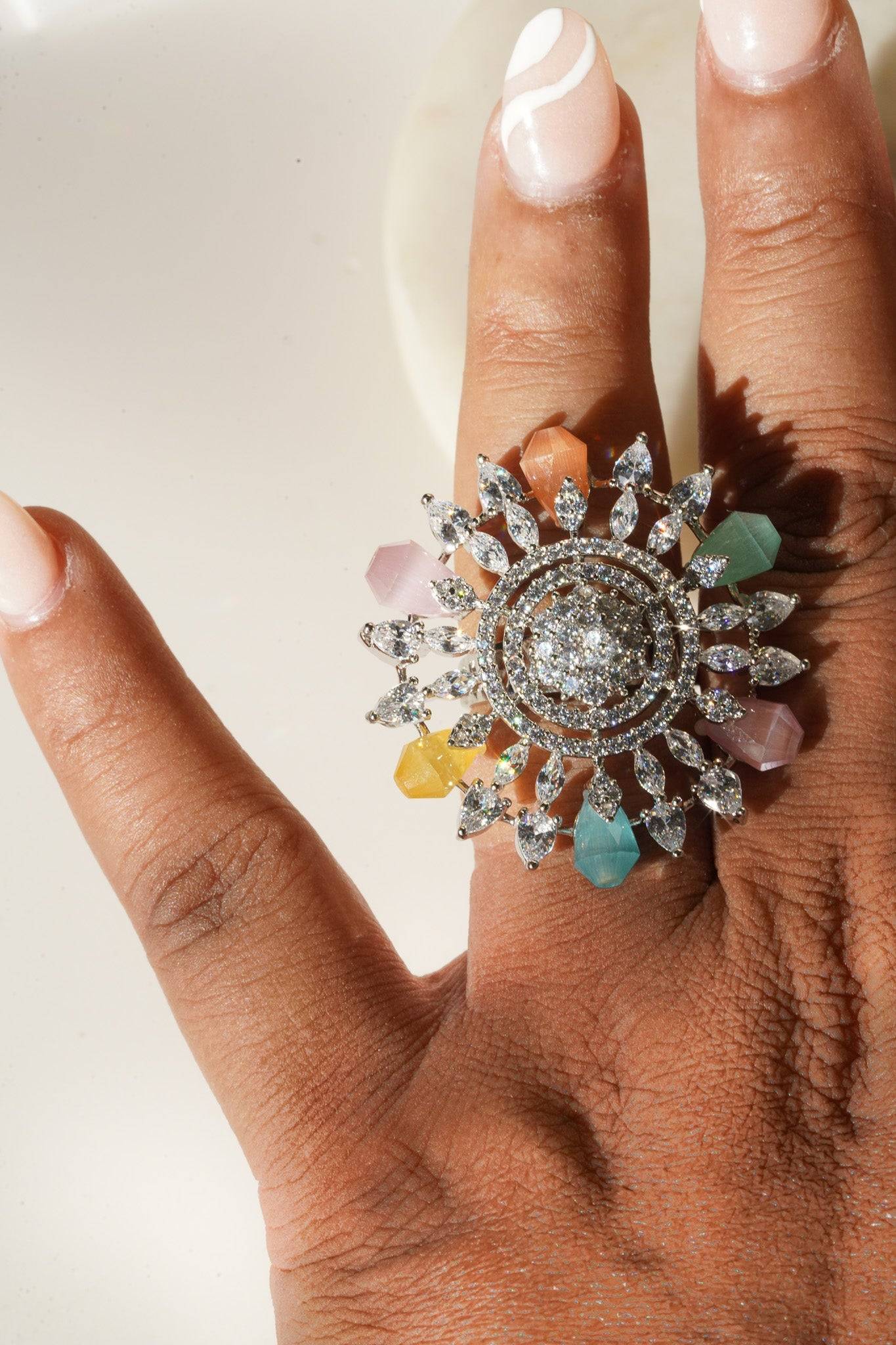 Keya Floral AD Ring - Rhodium-plated with AD stones in silver & ruby, silver & sapphire blue, silver & multicolor, and silver & pink/mint.