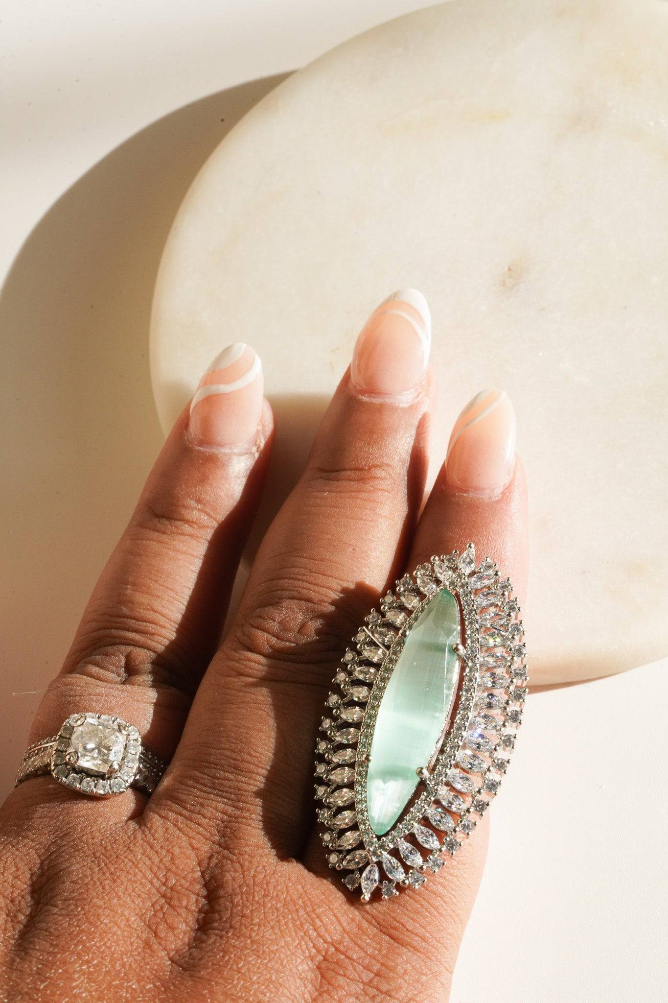 Marquise-Cut Oval Halo Statement Ring - Indian Jewelry - Featuring a captivating marquise-shaped center stone with a double halo.